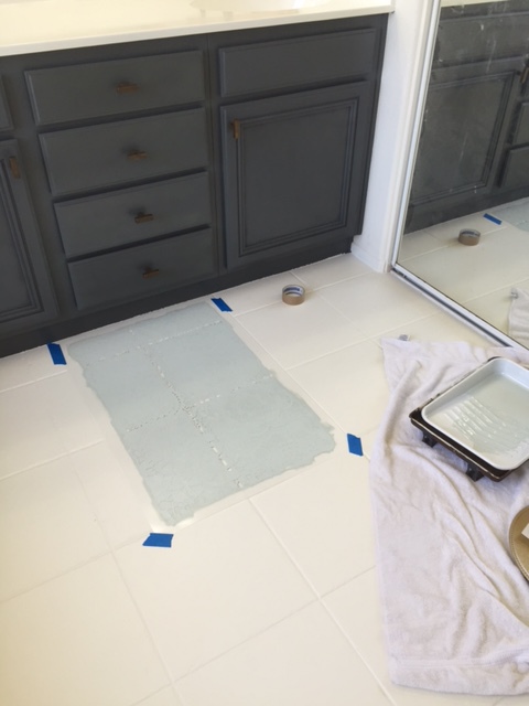 DIY for painting tile floors featured by top US lifestyle blog, Domestic Blonde: applying the floor paint