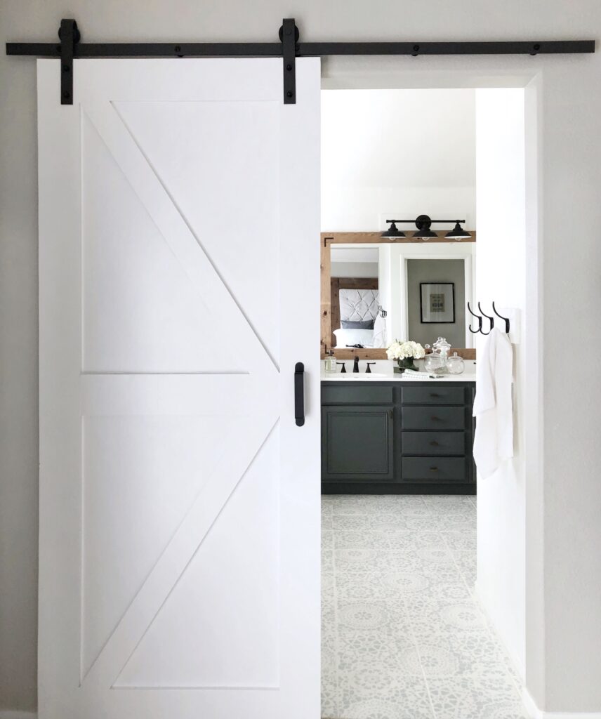 DIY Bathroom barn door tutorial featured by top DIY blog, Domestic Blonde: finished barn door