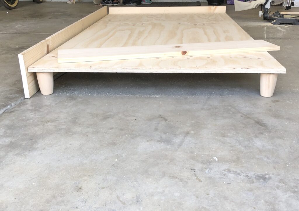 Blonde wood store platform bed