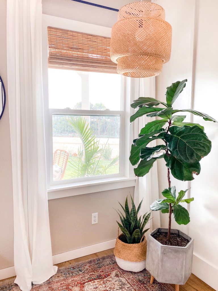 DIY Window Frame by popular San Diego DIY blog, Domestic Blonde: image of framed window in a living room. 