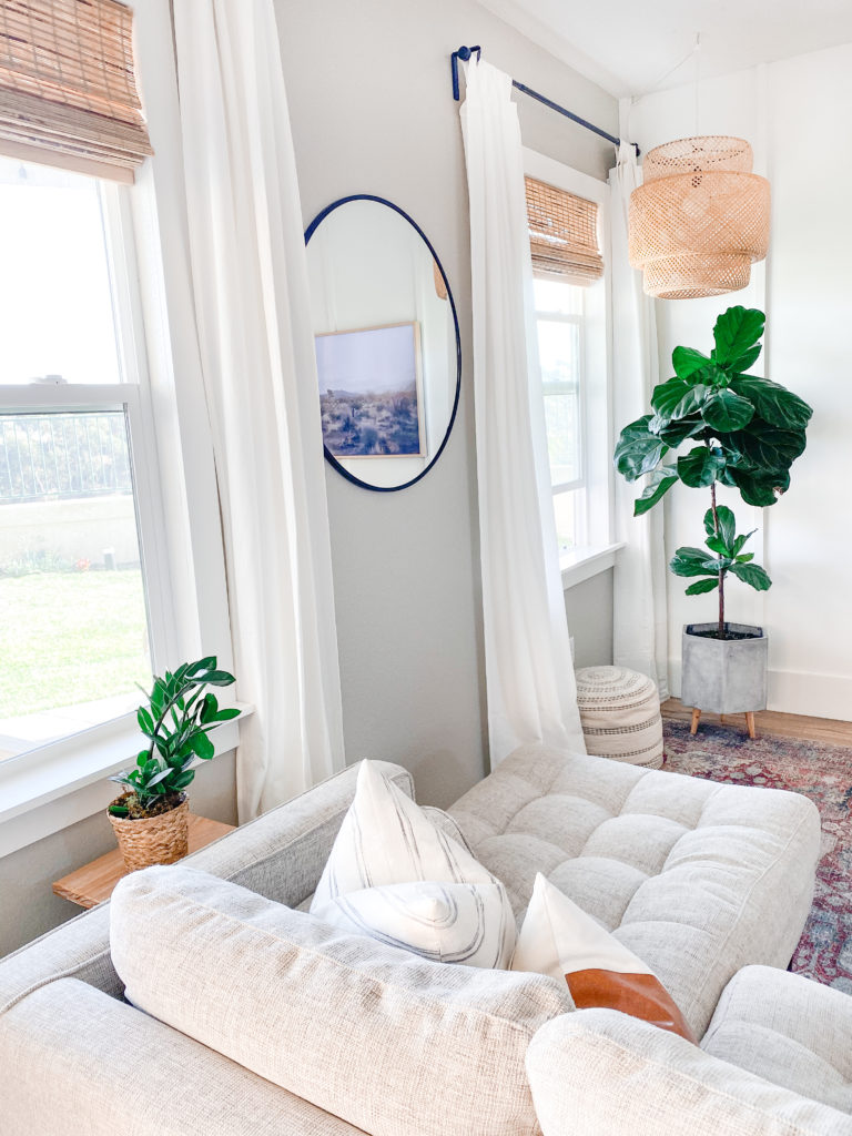 DIY Window Frame by popular San Diego DIY blog, Domestic Blonde: image of framed window in a living room. 