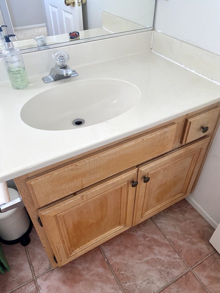 Kids Bathroom by popular San Diego interior design blog, Domestic Blonde: image of a dated bathroom. 